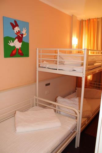 a bunk bed room with two bunk beds in it at Ferienwohnung an der Ostsee E311 in Brasilien