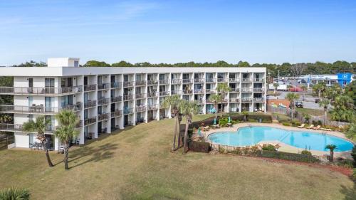 an aerial view of a hotel with a swimming pool at Pirates Bay B215 in Fort Walton Beach