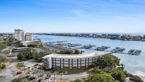 an aerial view of a building next to a body of water at Pirates Bay B215 in Fort Walton Beach