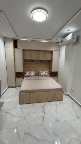 a bedroom with a large bed in a room at Allaoua in Stamboul