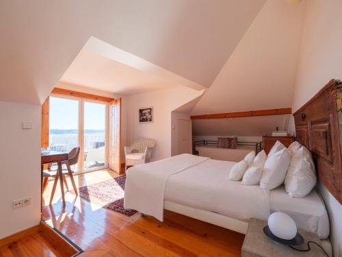Breathtaking River-City View Two Private Terraces 3 Bedrooms and 3 Bathrooms 17th Century Building Central Bica Chiado District