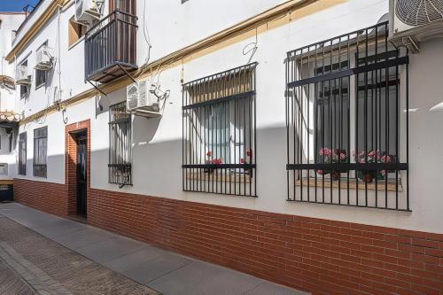 San Basilio in Bloom Steps from Alcazar Mosque