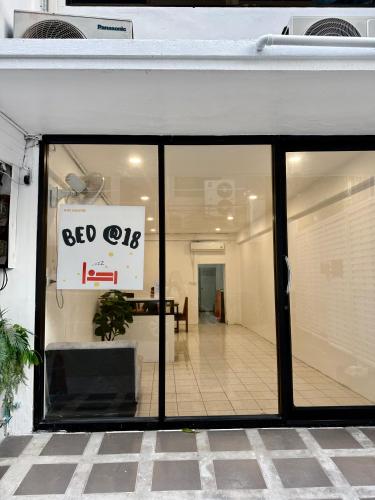 a store window with a ceo sign on it at BED at 18 Asoke in Bangkok