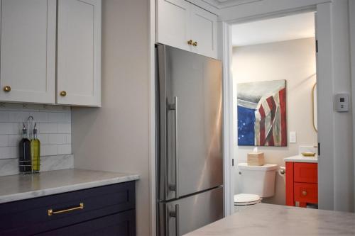 a kitchen with a stainless steel refrigerator at Stars And Stripes in Kennebunkport