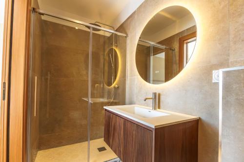 a bathroom with a sink and a shower at Juliette in Venaco