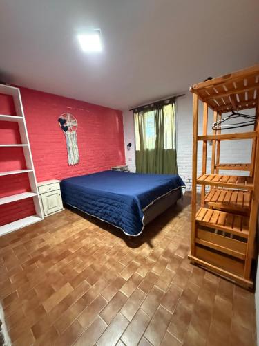 a bedroom with a bed and a basketball wall at Le de nery in Ostende
