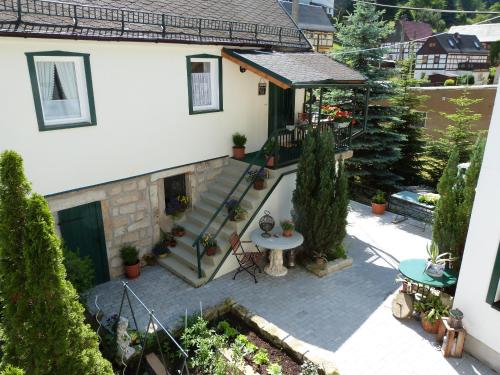 an aerial view of a house with a patio at Ferienhäusl am Malerweg in Bad Schandau