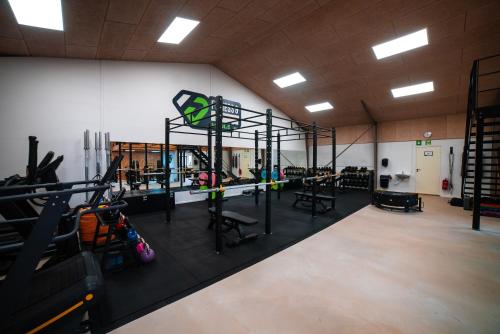 an overhead view of a fitness room with a gym at Modern Apartment With Fitness in Hejls