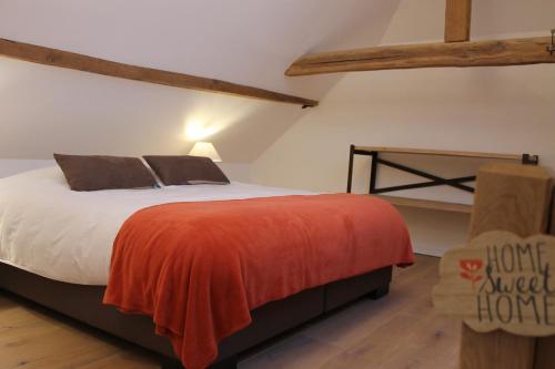 Ein Bett oder Betten in einem Zimmer der Unterkunft Chante-Pierre