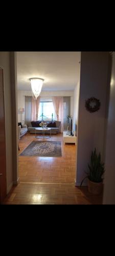 a living room with a couch and a table at Karlskrona centrum in Karlskrona