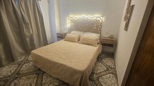 Llit o llits en una habitació de Refugio del Jagüel Dto Familiar Equipado Centro Munro Cerca Tecnópolis y River
