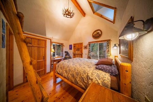 a bedroom with a bed in a room at Campfire Ranch All-Inclusive Lodge in Truckee