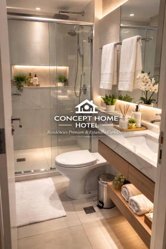 a bathroom with a shower and a toilet and a sink at Astron Mundial luxo Concept in Salvador