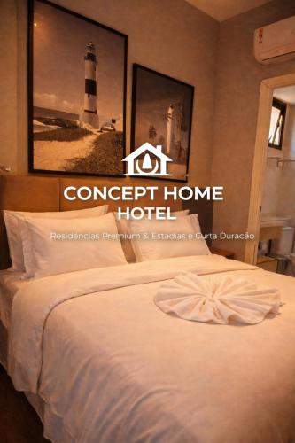 a hotel room with a bed and a lighthouse at Astron Mundial luxo Concept in Salvador