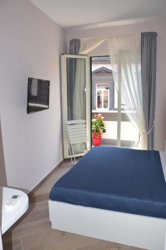 En eller flere senge i et værelse på B&B Federico II