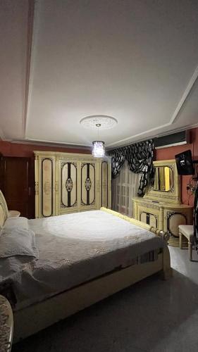a bedroom with a large bed in a room at Nador in Nador