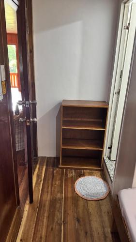 a room with a staircase and a room with a door at Port Barton - Paradiso Azul Campsite Beachfront with Internet in San Vicente
