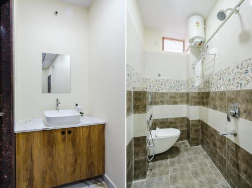 a bathroom with a sink and a toilet at Hotel Prestige Grand, Manikonda in Haidar Sāhibgūda