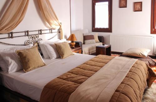 Katil atau katil-katil dalam bilik di Archontiko Xantha