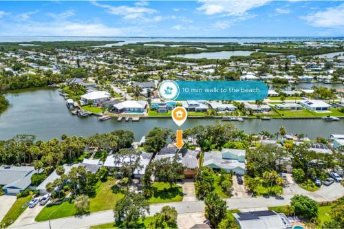 an aerial view of a marina with a sign that reads to run way to at 464 Indian Creek Dr in Cocoa Beach