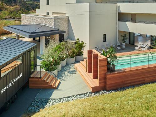 an image of a house with a swimming pool at seven x seven Itoshima in Itoshima