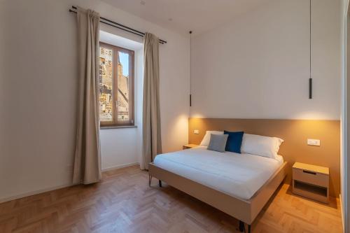 JOIVY Stylish 2-Bedroom Accommodations near the Colosseum