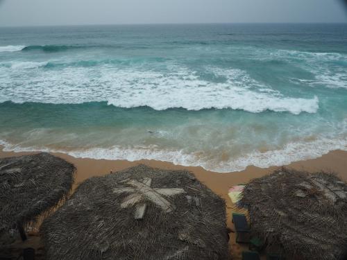 an aerial view of the ocean and the beach at Main Reef Guest House in Hikkaduwa