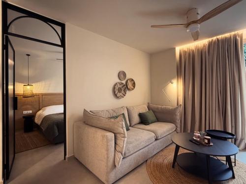 a living room with a couch and a bedroom at Central Luxury Sea View Apartment in Chalkida