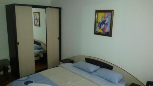 Postel nebo postele na pokoji v ubytování Alexander Flora Apartment