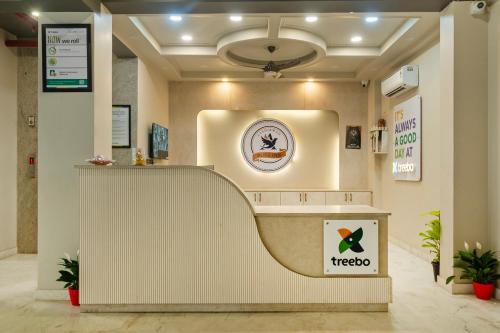 a reception area of a taco restaurant with a counter at Treebo Aashirwad Bliss Inn With Swimming Pool in Jaipur