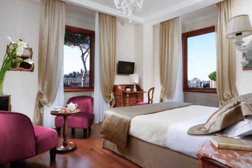 a hotel room with a bed and a window at Hotel Forum in Rome
