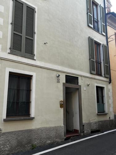 a building with a door on the side of a street at P4 Crema Home in Crema