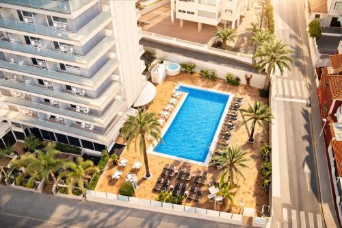 an overhead view of a building with a swimming pool at Hotel RH Royal - Recommend for adults in Benidorm