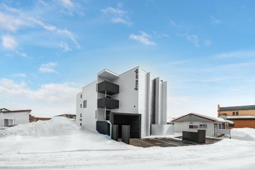 a rendering of a building in the snow at Gran Hills in Chitose