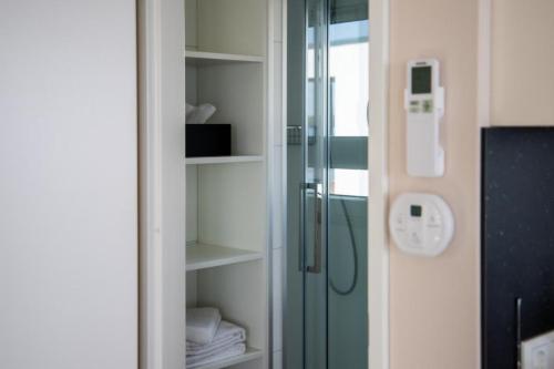 a bathroom with a shower and a glass shower backdoor at Floatinghouse Queen - LP6 in Vetschau