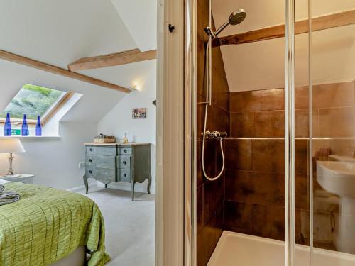 a bathroom with a shower and a sink at 5 Bed in Dulverton oc-41133 in Brushford