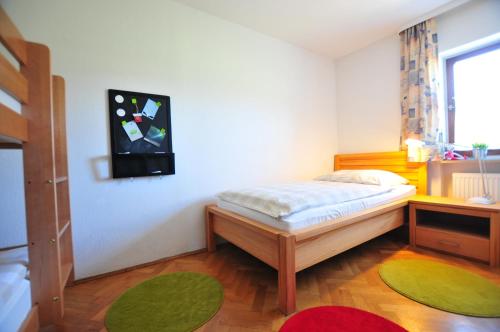 Ένα ή περισσότερα κρεβάτια σε δωμάτιο στο Ferienhaus Mühlblick