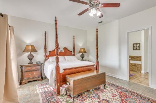 a bedroom with a bed and a ceiling fan at Private Pool + Patio: Pensacola Family Home! in Perdido Key
