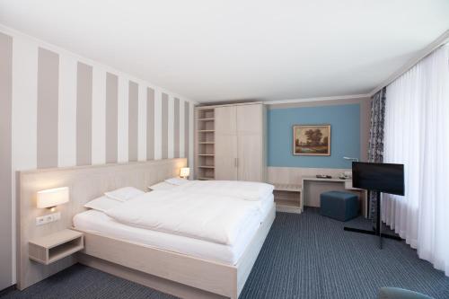 เตียงในห้องที่ Hotel Seelust