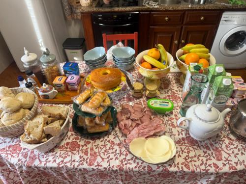 a table with a bunch of food on it at Casa Vicente in Lamego