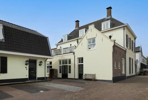 a group of white buildings sitting next to each other at Steenhof Residence Warmond in Warmond