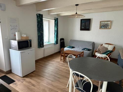 Virtuvė arba virtuvėlė apgyvendinimo įstaigoje La P'tite Maison