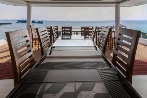 a table and chairs on the back of a boat at Blue Sea Explorer in Male City