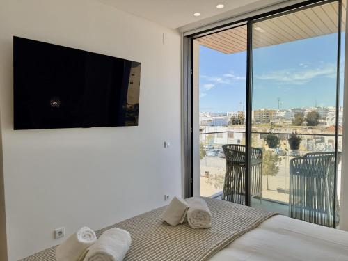 Bunksy Flat Delmar Waterfront Living Olhão by Junto ao Mar