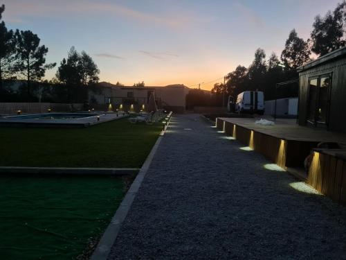 a backyard with a park with a playground at Quinta da Carolina in Sebolido