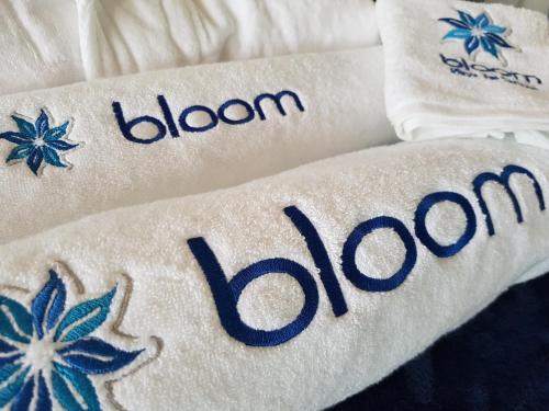 a close up of a towel with the word bloomcolo at Bloom! exclusive boutique b&b in Playa del Carmen