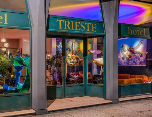 a store front of a triste hotel with windows at Boutique Hotel Trieste - Adults Only in Verona