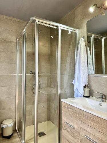 a bathroom with a shower and a sink at Casa La Ería in Sevares