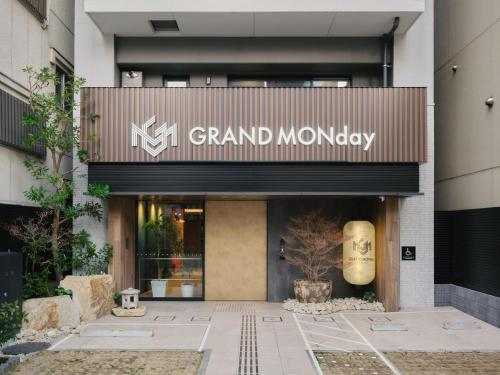 a grand monday store front with a sign on it at GRAND MONday ASAKUSA in Tokyo