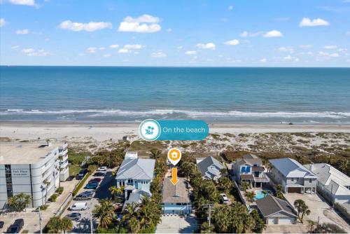 an aerial view of a beach with condos at 111 S Atlantic Ave in Cocoa Beach